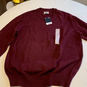 Burgundy pullover sweater.